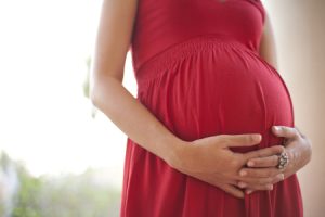 Pregnant Woman Holding Her Belly